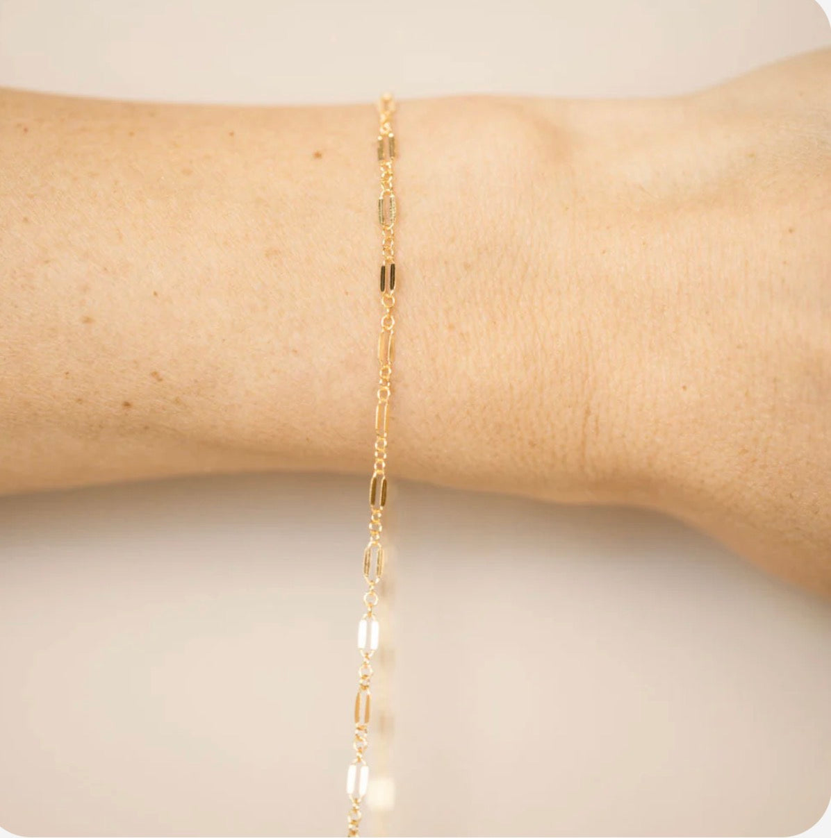 Triple Link Dapped in Gold